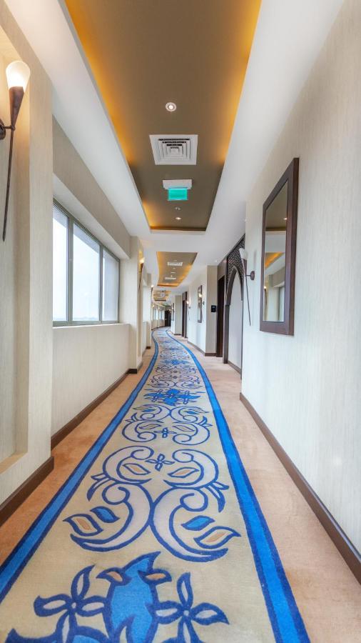 Grand Millennium Gizan Hotel Jizan Exterior photo A corridor at the hotel