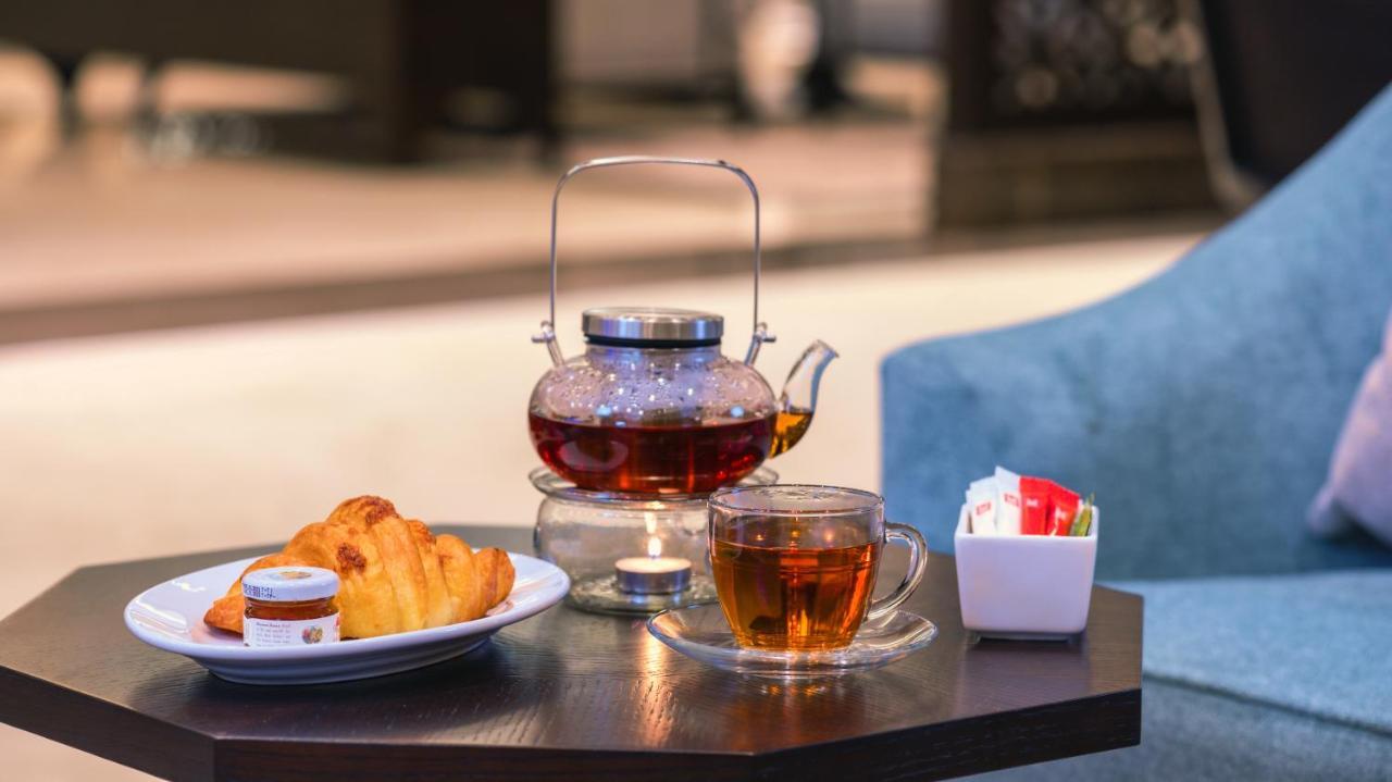 Grand Millennium Gizan Hotel Jizan Exterior photo A glass teapot