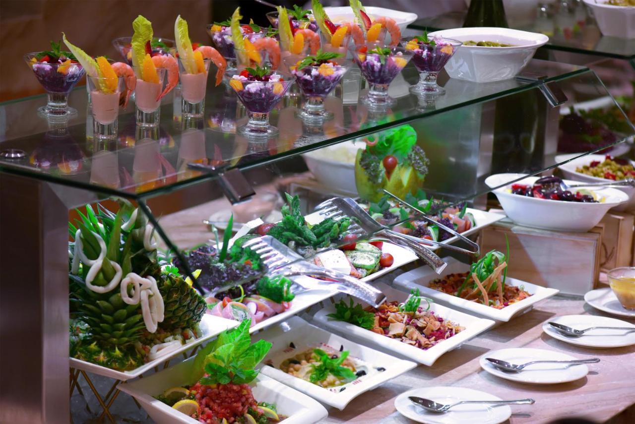 Grand Millennium Gizan Hotel Jizan Exterior photo A salad bar